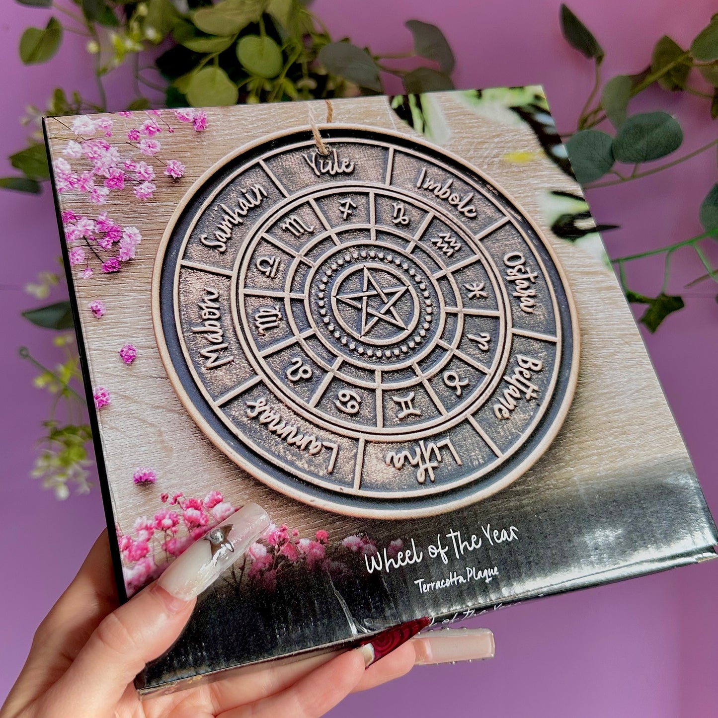 bronze wheel of the year hanging terracotta plaque