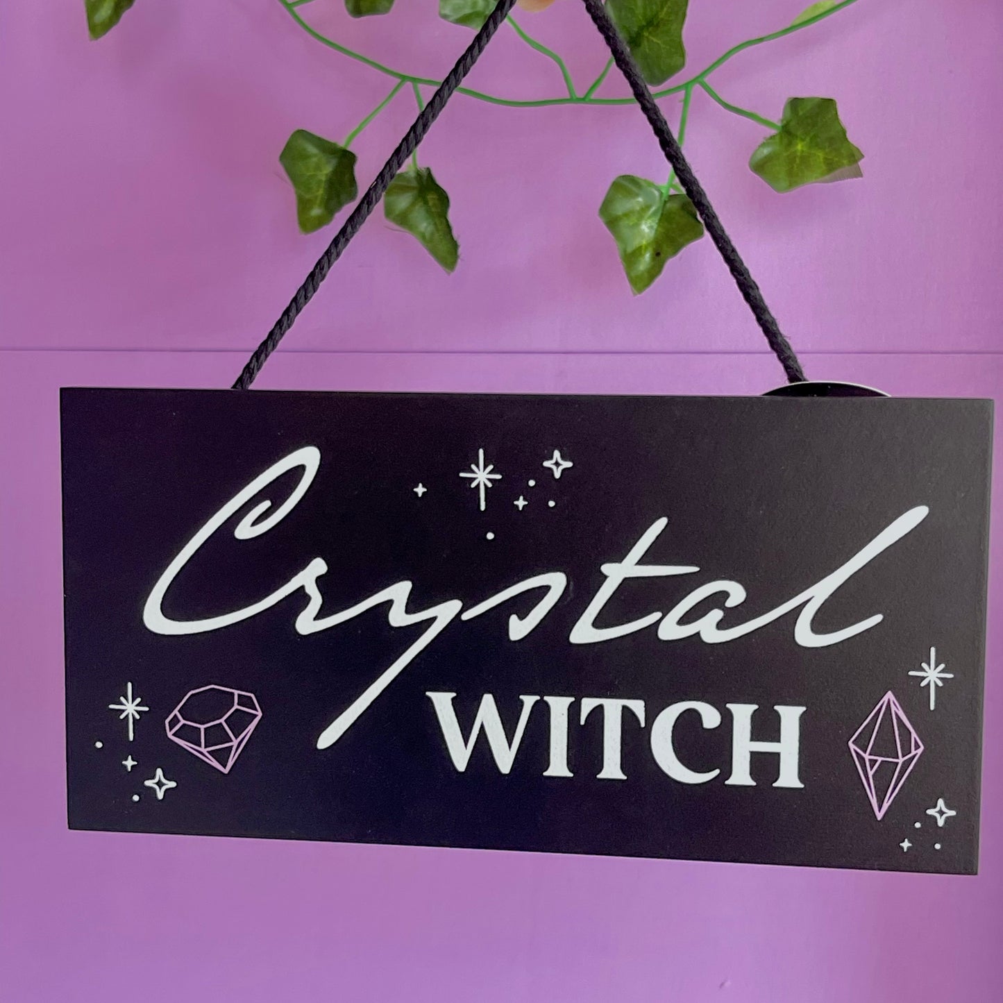 ‘crystal witch’ hanging sign