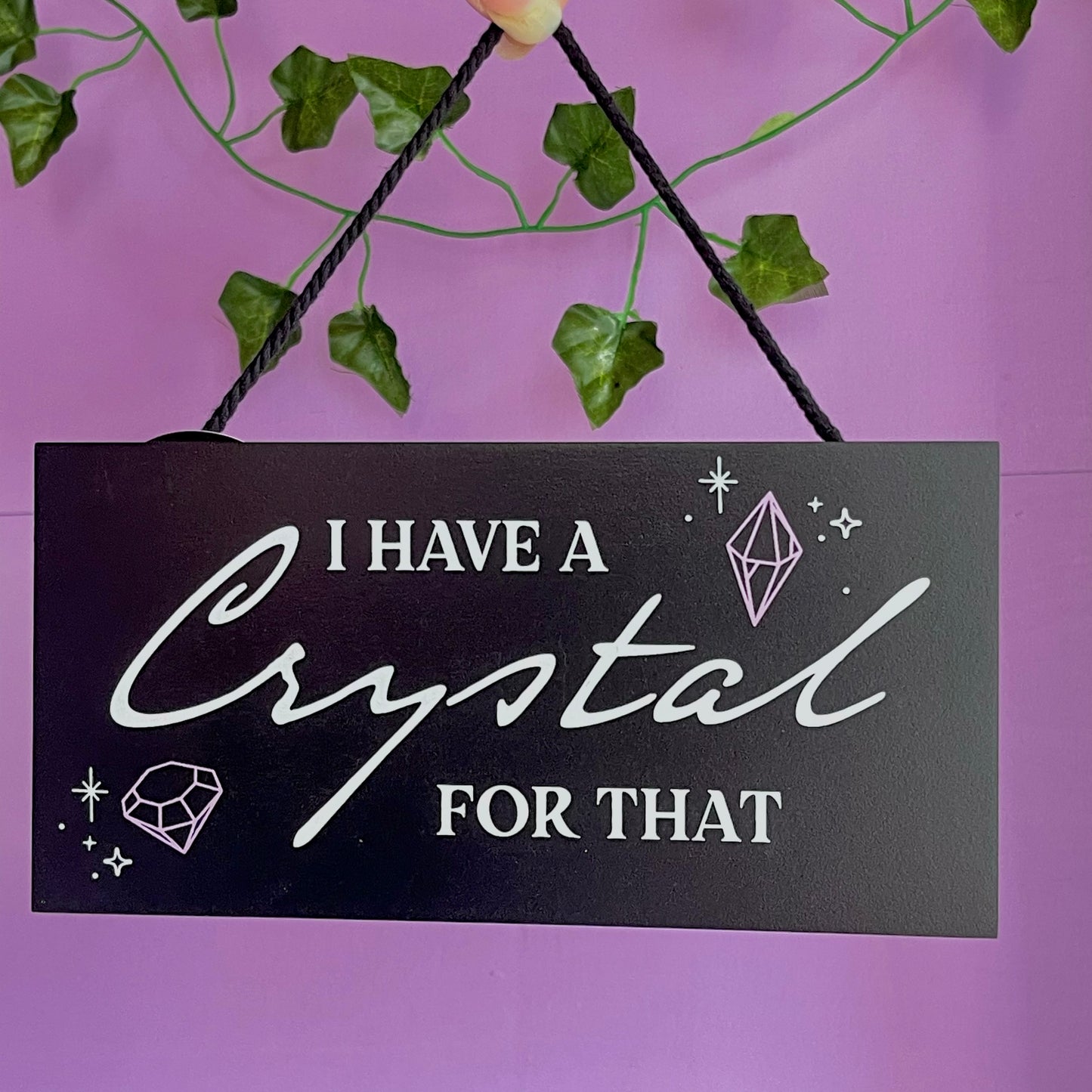 ‘I have a crystal for that’ hanging sign