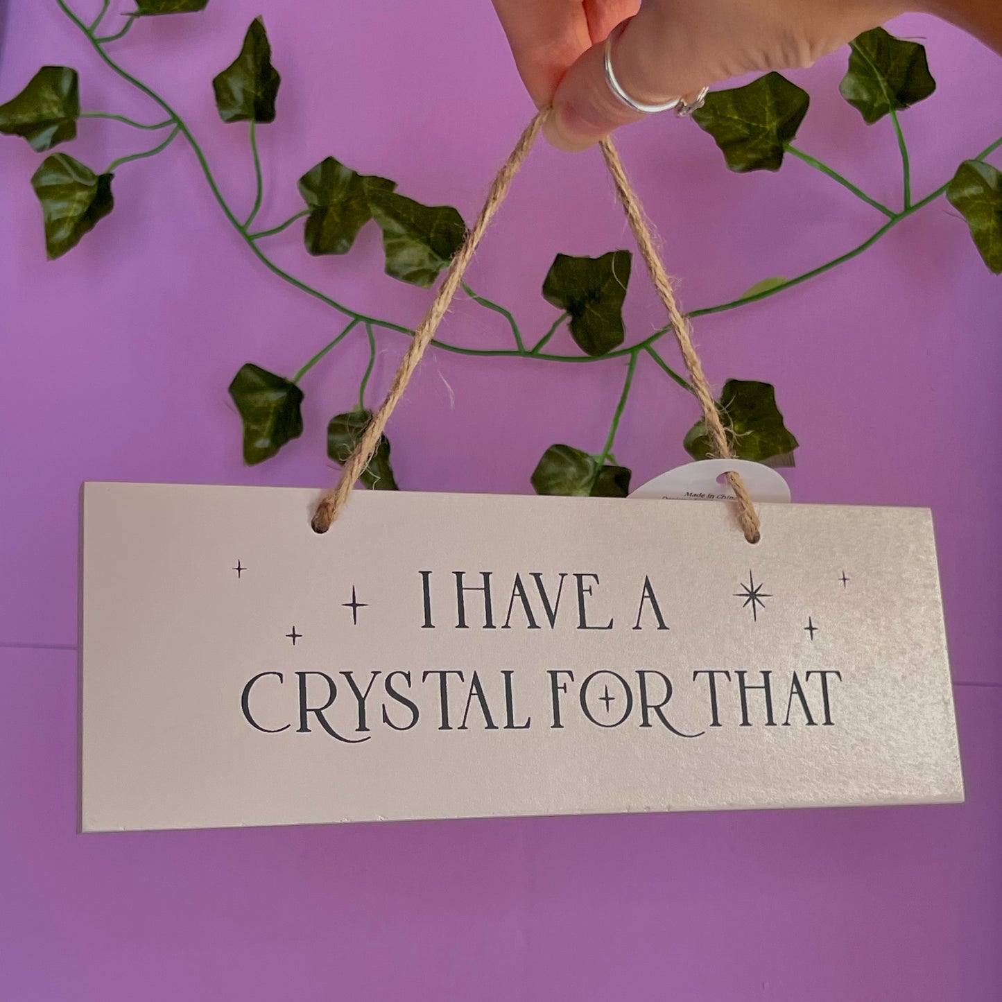 ‘I have a crystal for that’ hanging sign