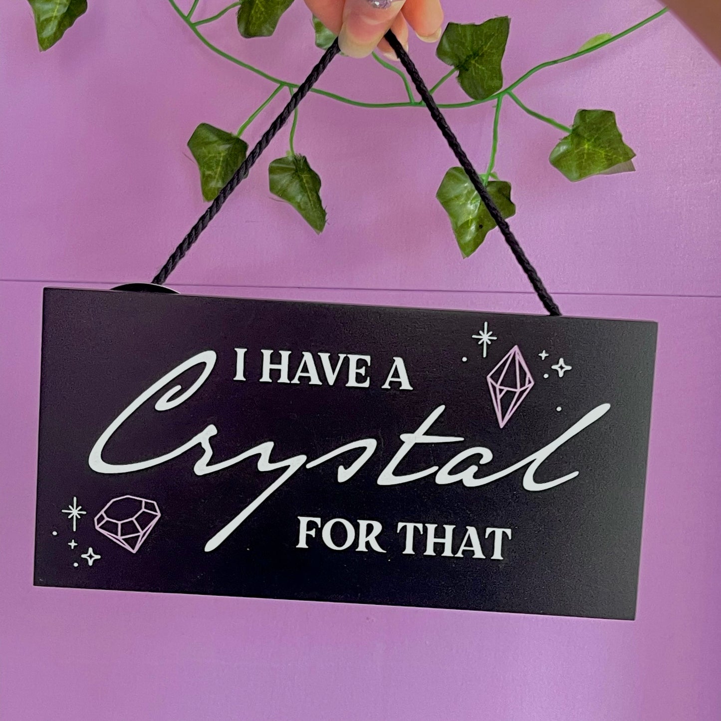 ‘I have a crystal for that’ hanging sign