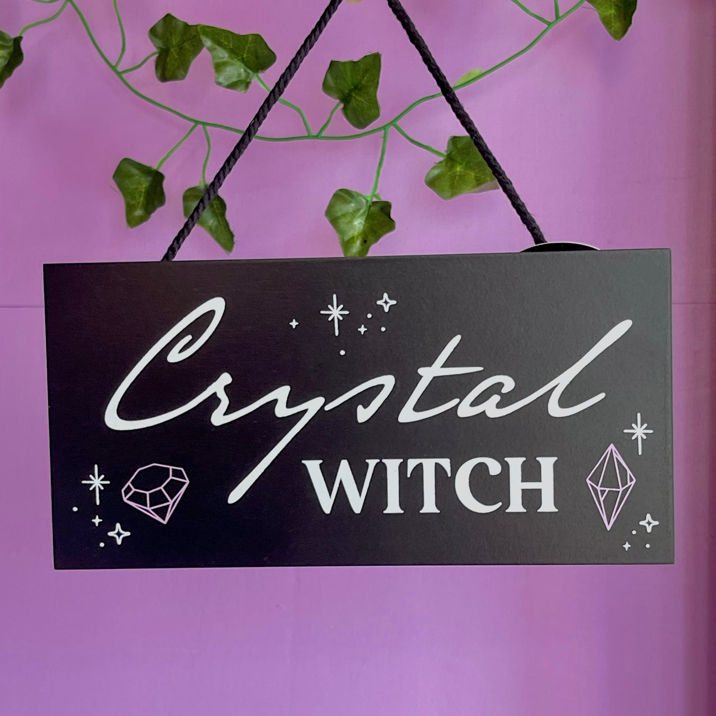 ‘crystal witch’ hanging sign