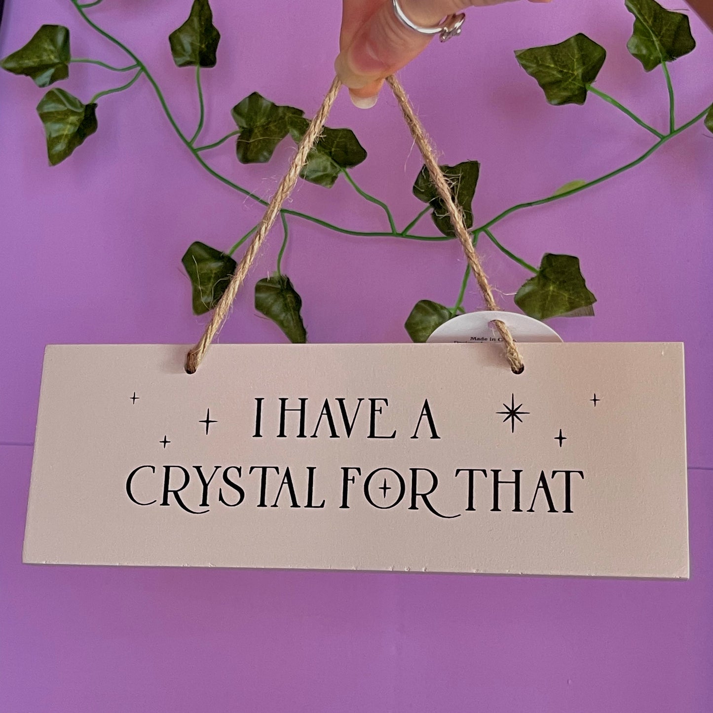 ‘I have a crystal for that’ hanging sign