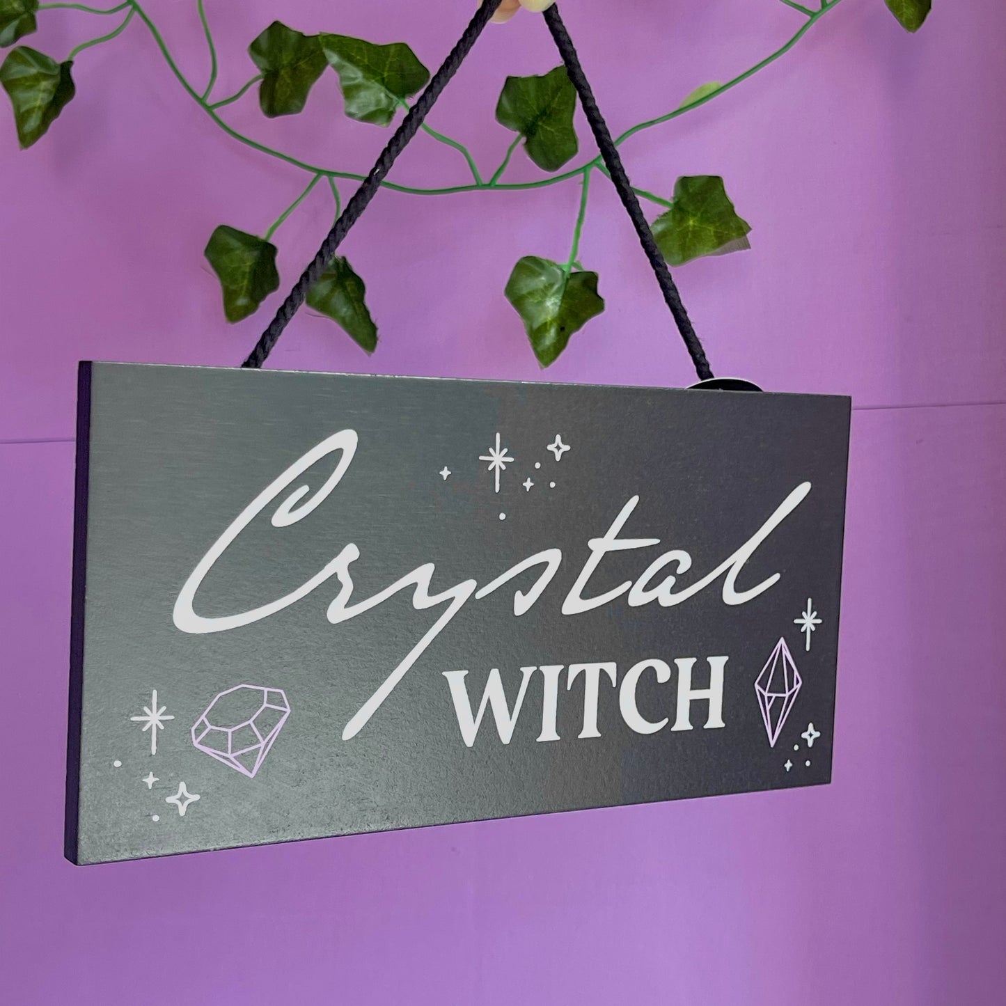 ‘crystal witch’ hanging sign