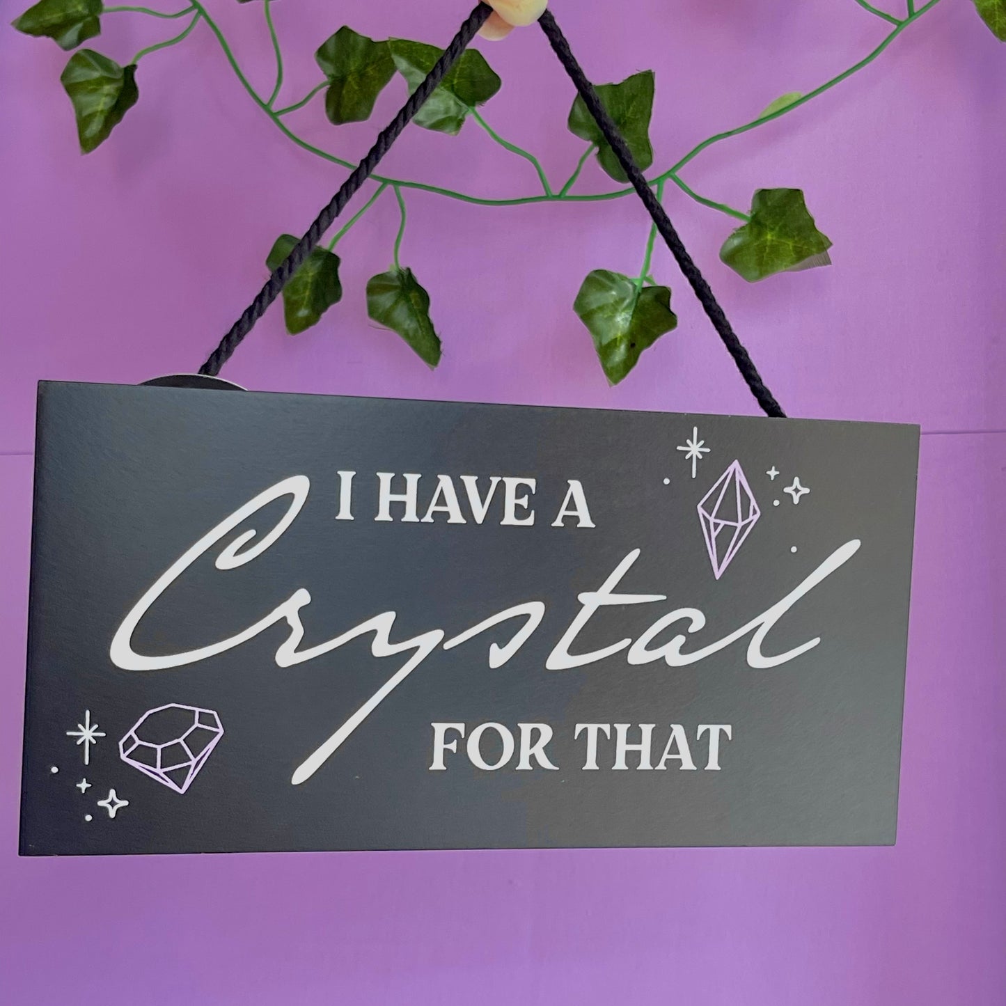 ‘I have a crystal for that’ hanging sign