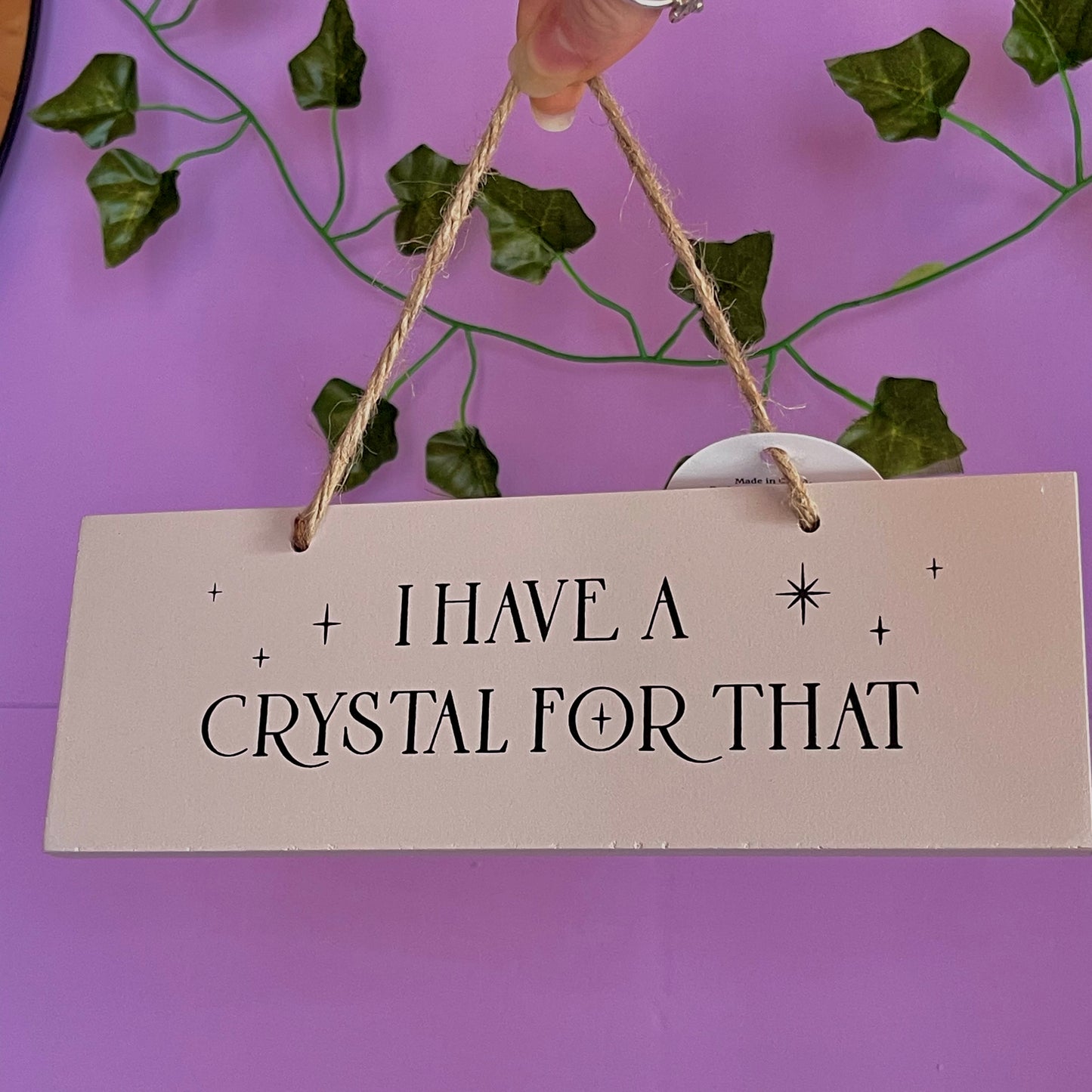 ‘I have a crystal for that’ hanging sign