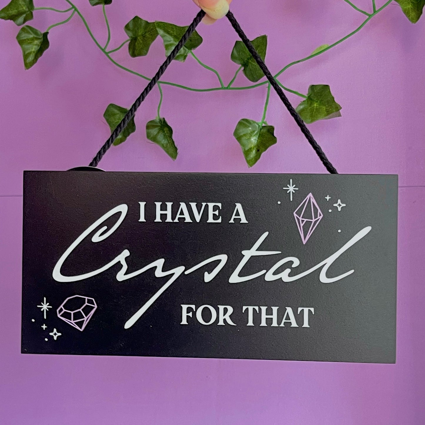 ‘I have a crystal for that’ hanging sign