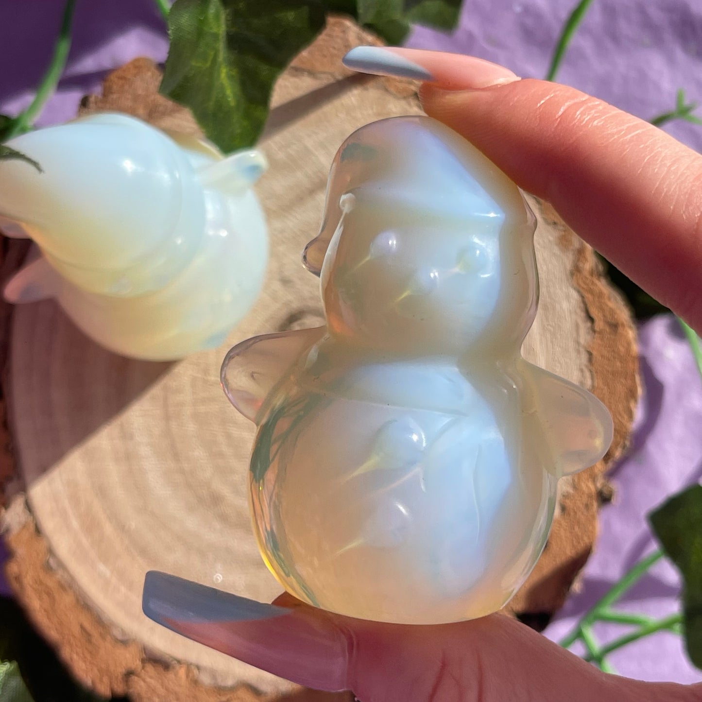 opalite snowman carving