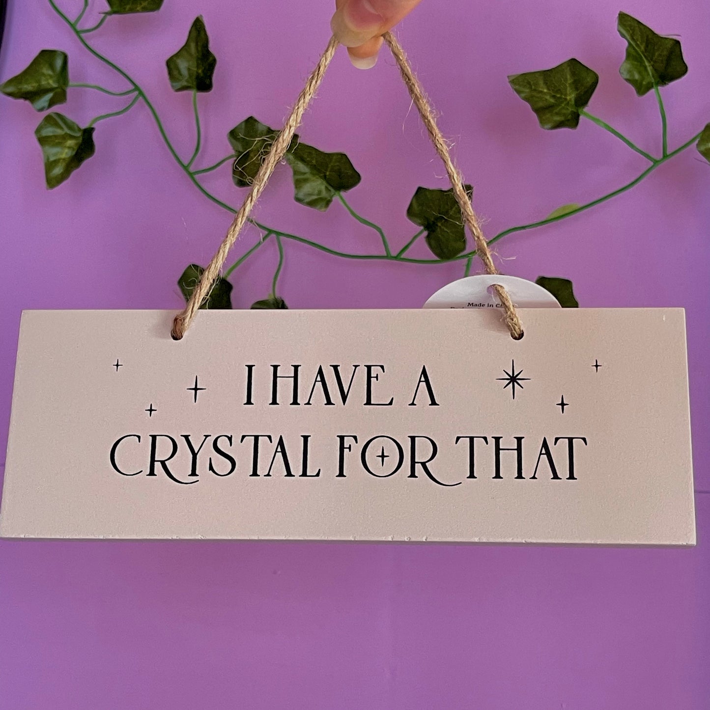 ‘I have a crystal for that’ hanging sign