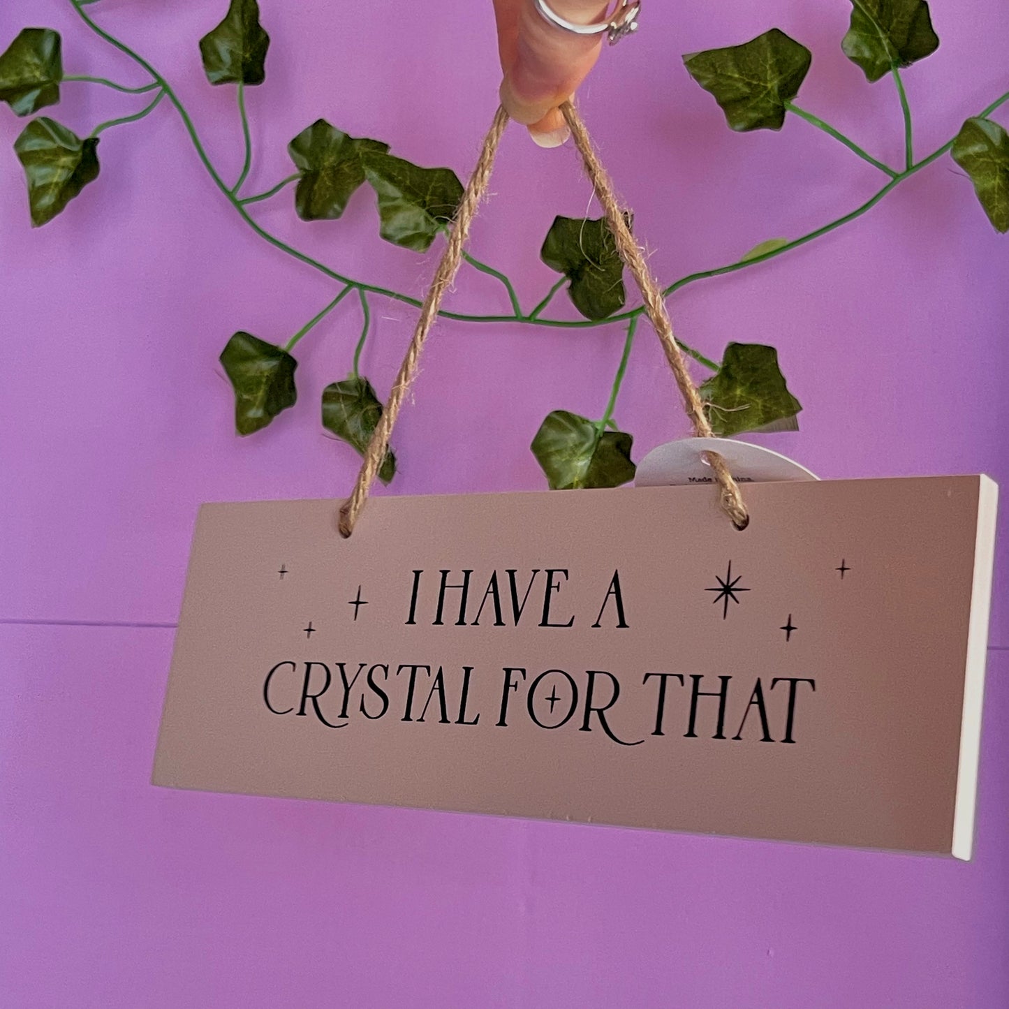 ‘I have a crystal for that’ hanging sign