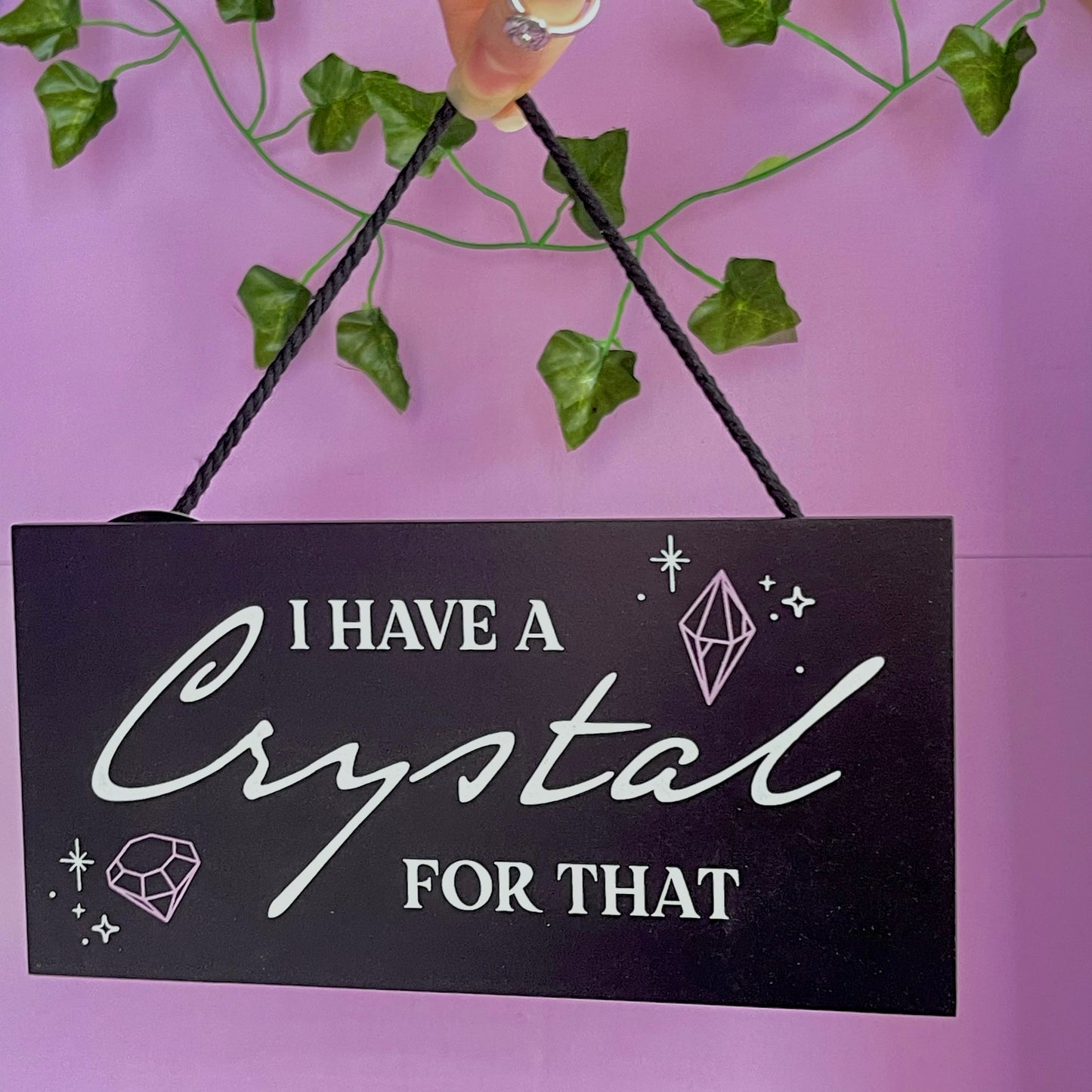 ‘I have a crystal for that’ hanging sign