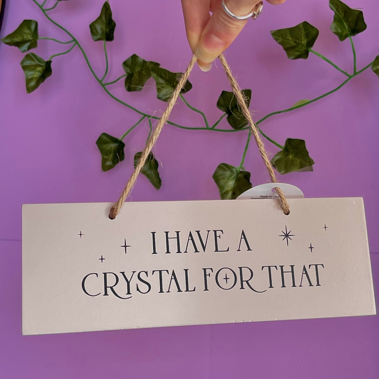 ‘I have a crystal for that’ hanging sign