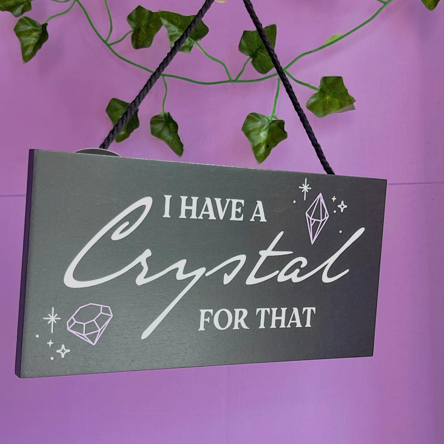 ‘I have a crystal for that’ hanging sign