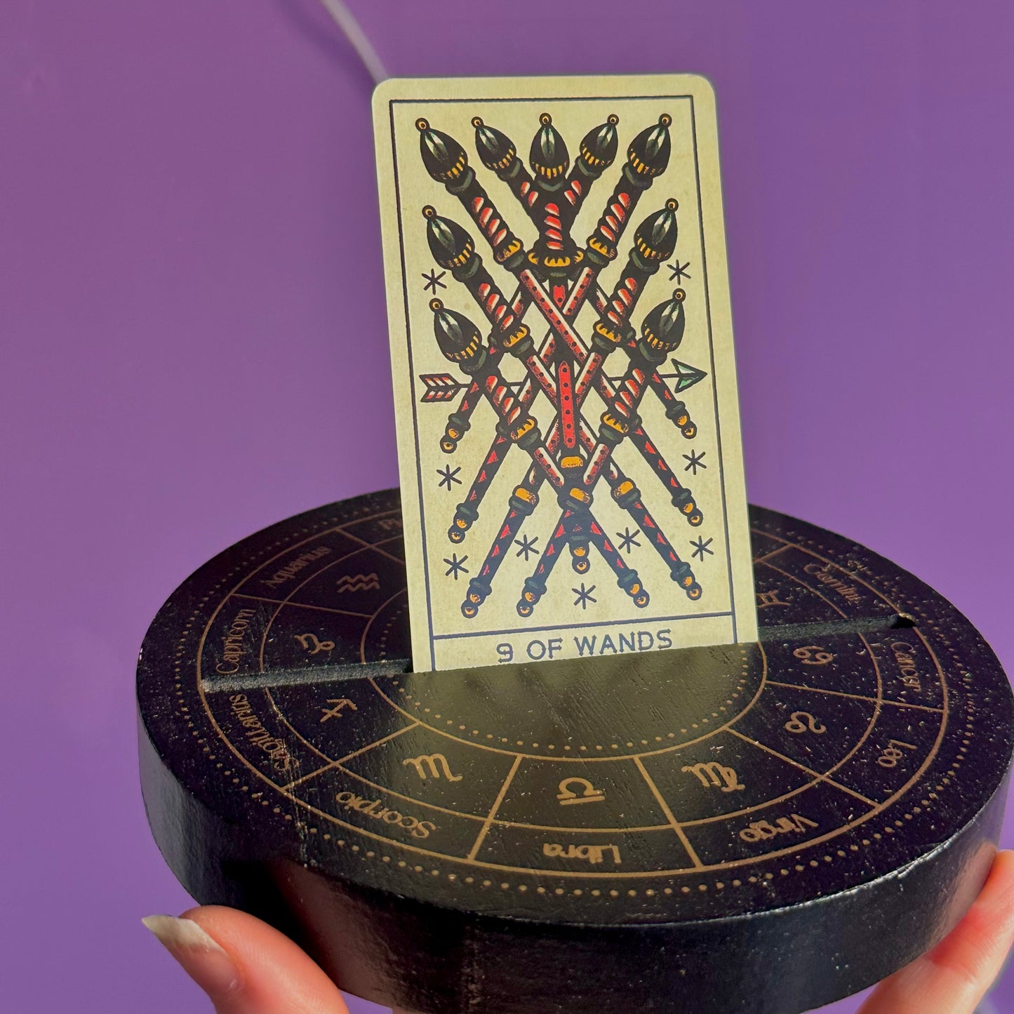 black astrology wheel tarot card stand