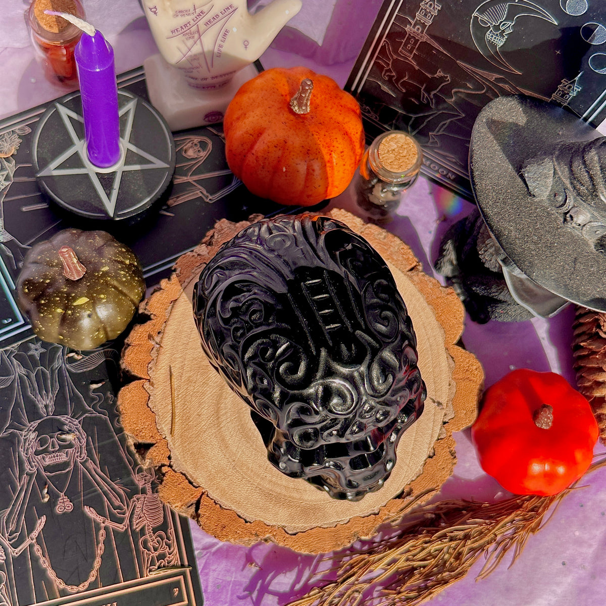 obsidian flower skull carving