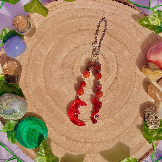 red moon car charm