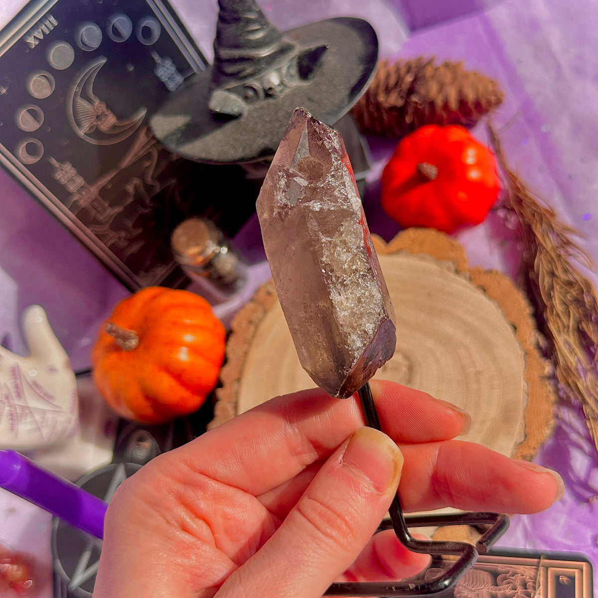 smoky quartz point on stand