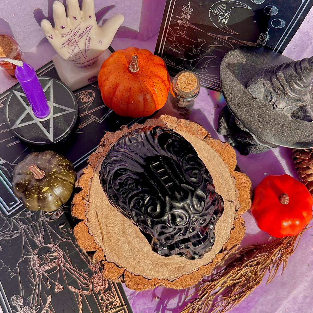 obsidian flower skull carving