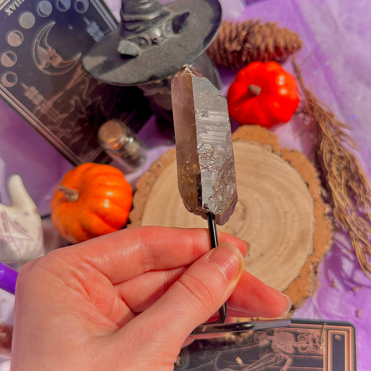 smoky quartz point on stand