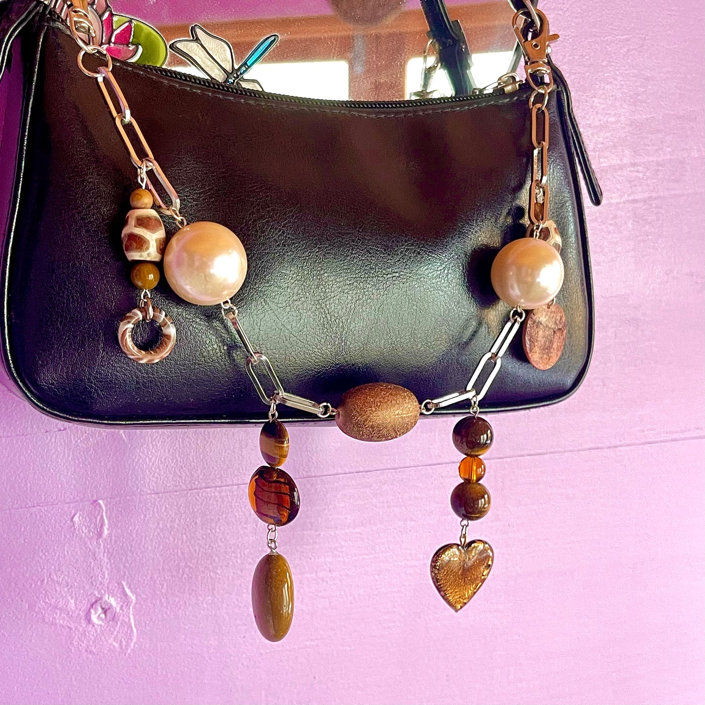 strength bag charm