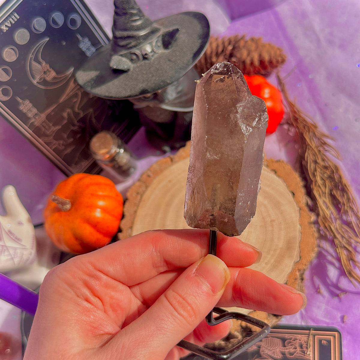 smoky quartz point on stand