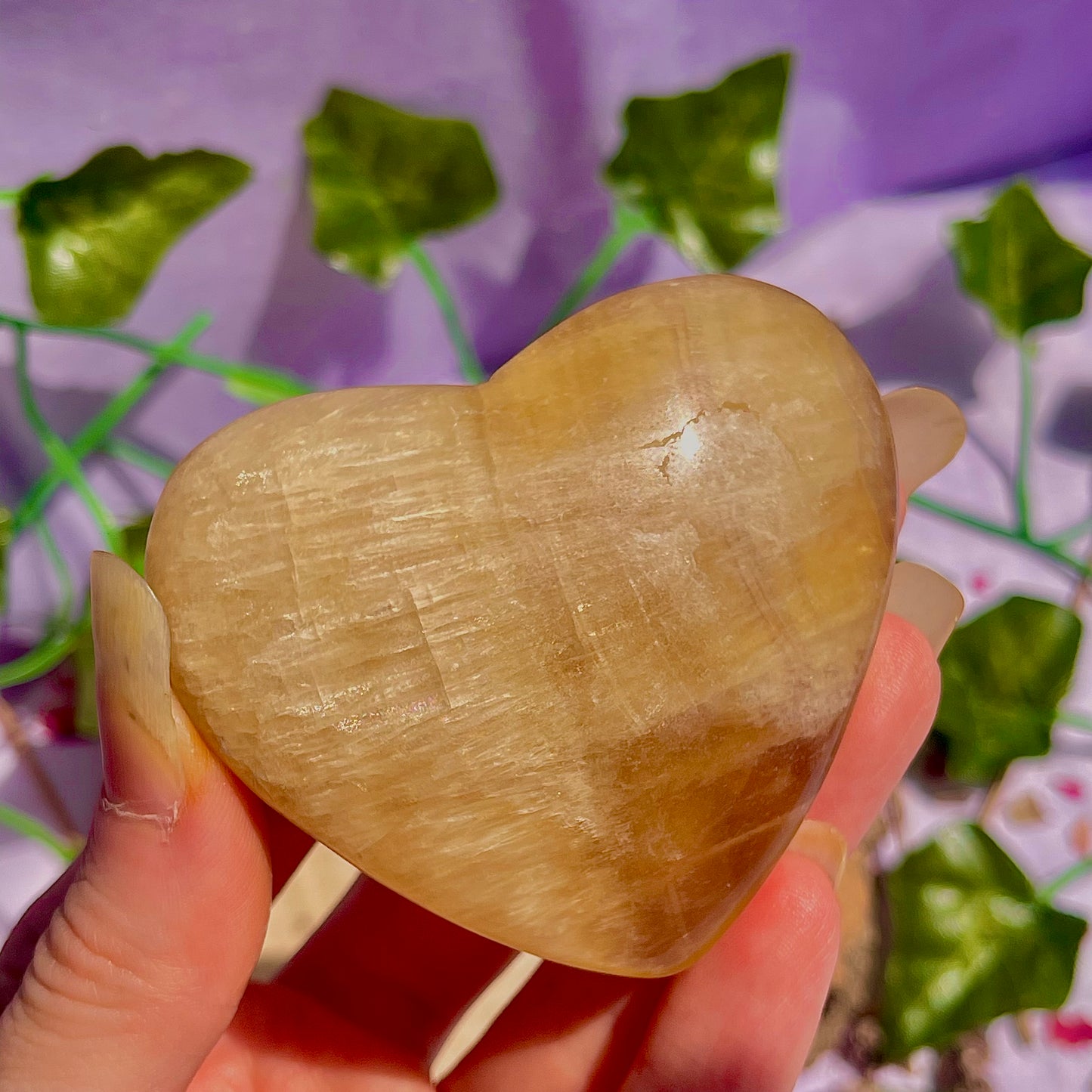 yellow fluorite heart carving