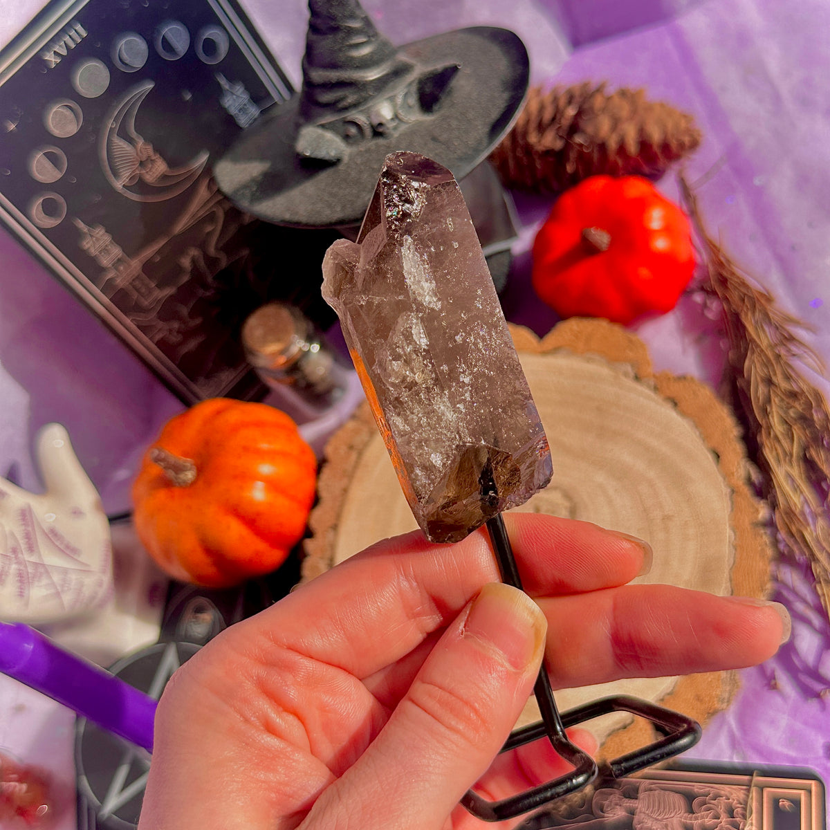 smoky quartz point on stand