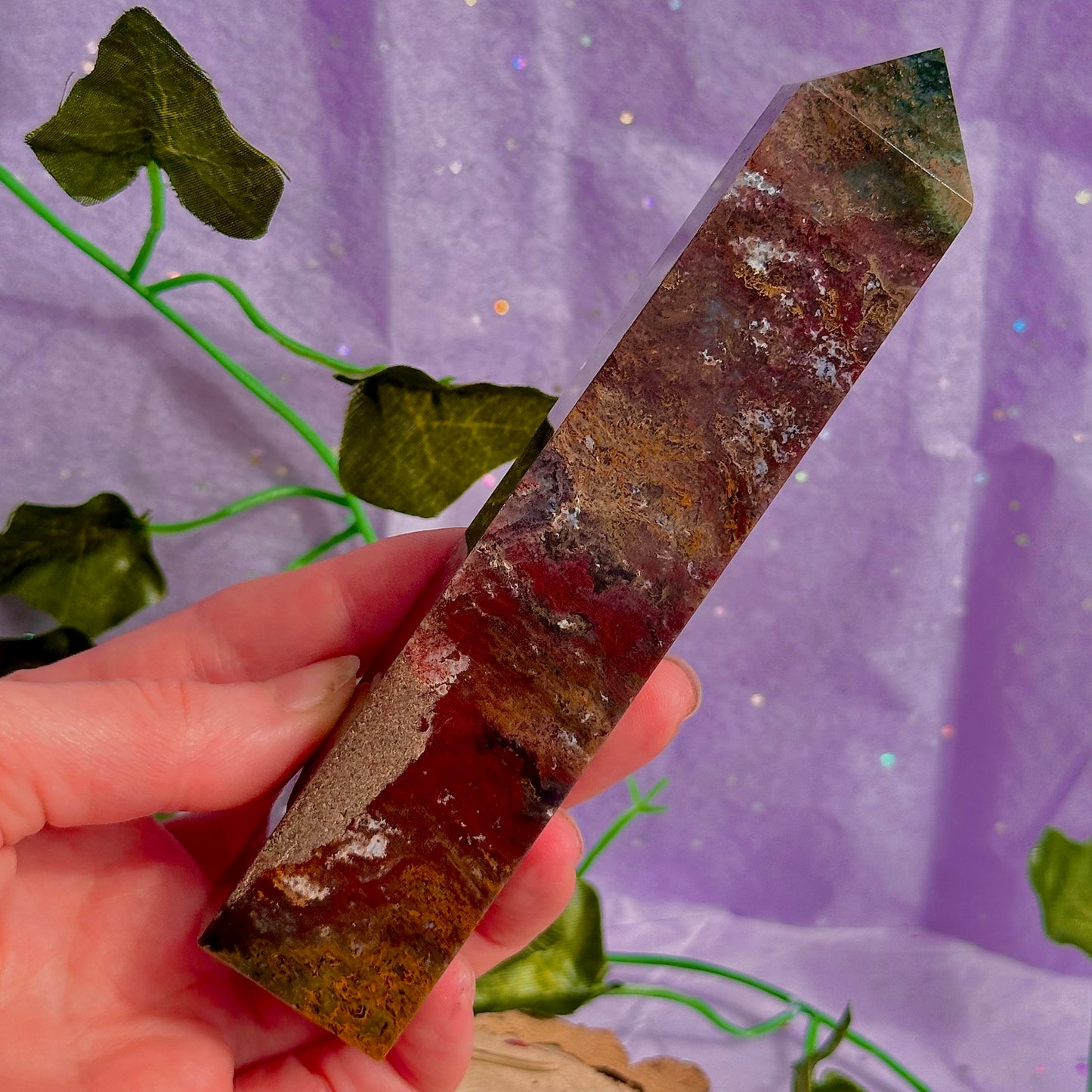 red moss agate tower