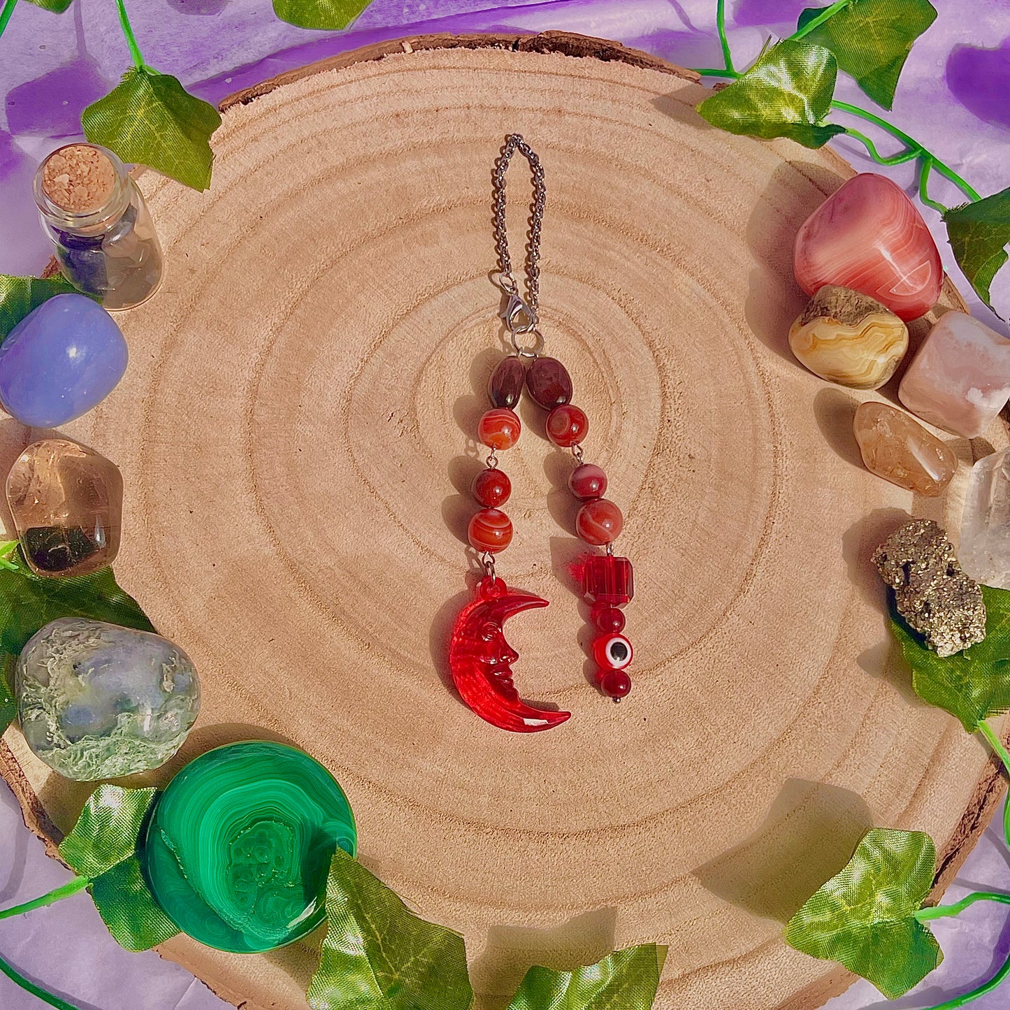 red moon car charm