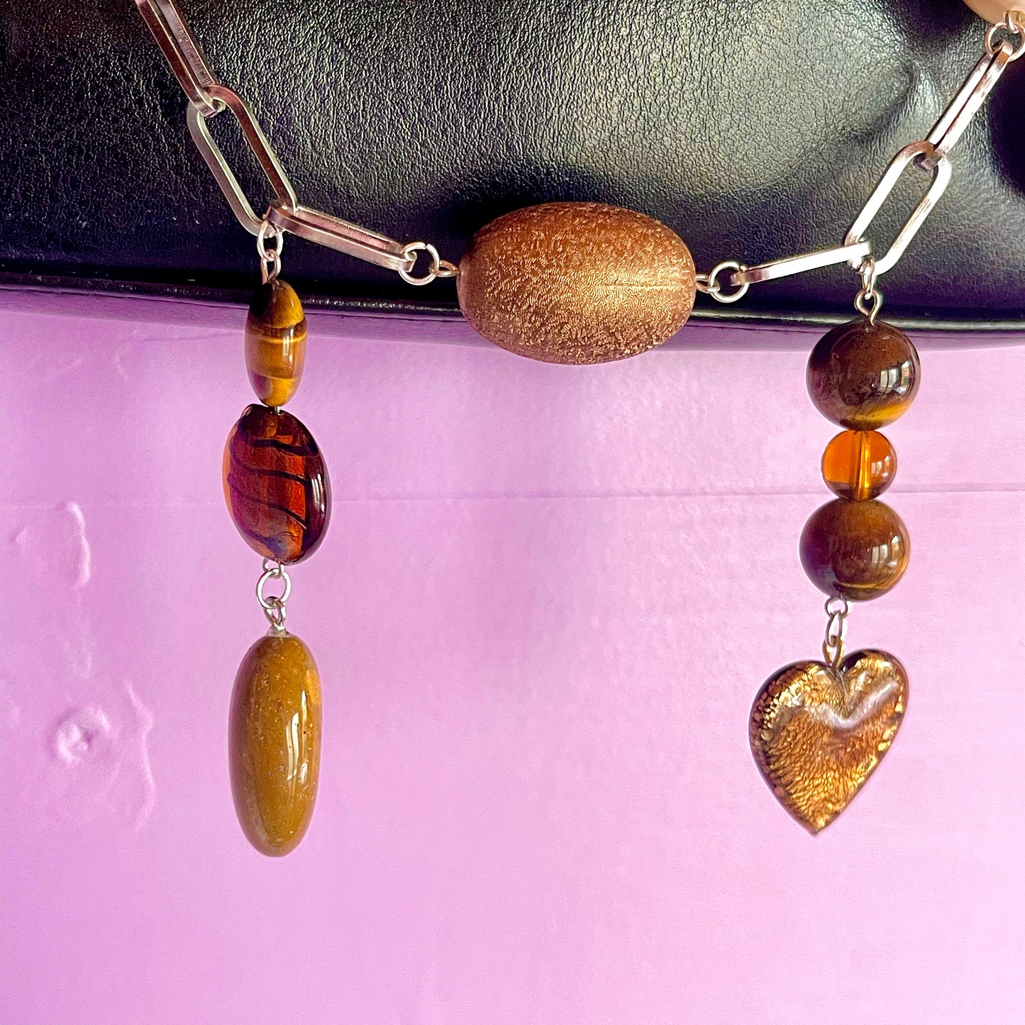 strength bag charm