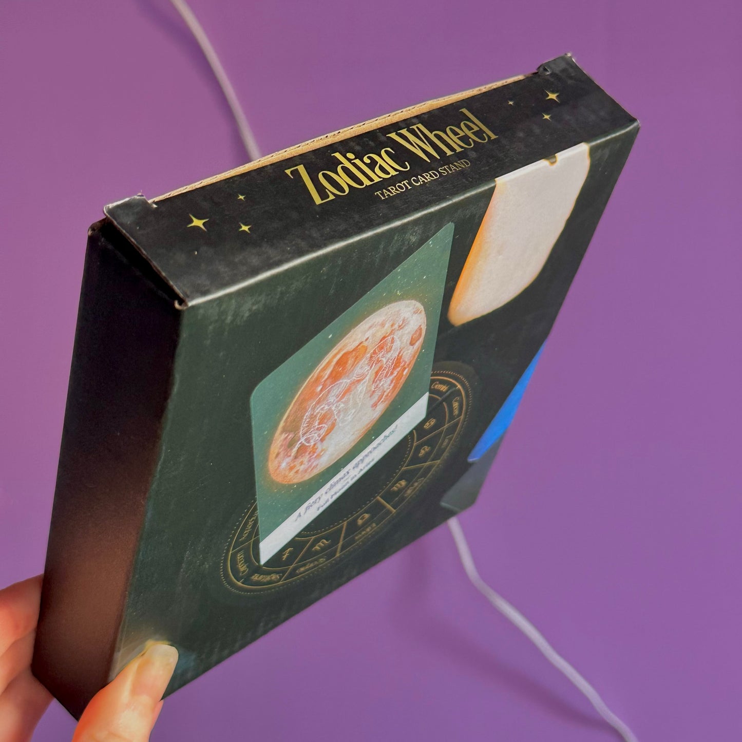 black astrology wheel tarot card stand