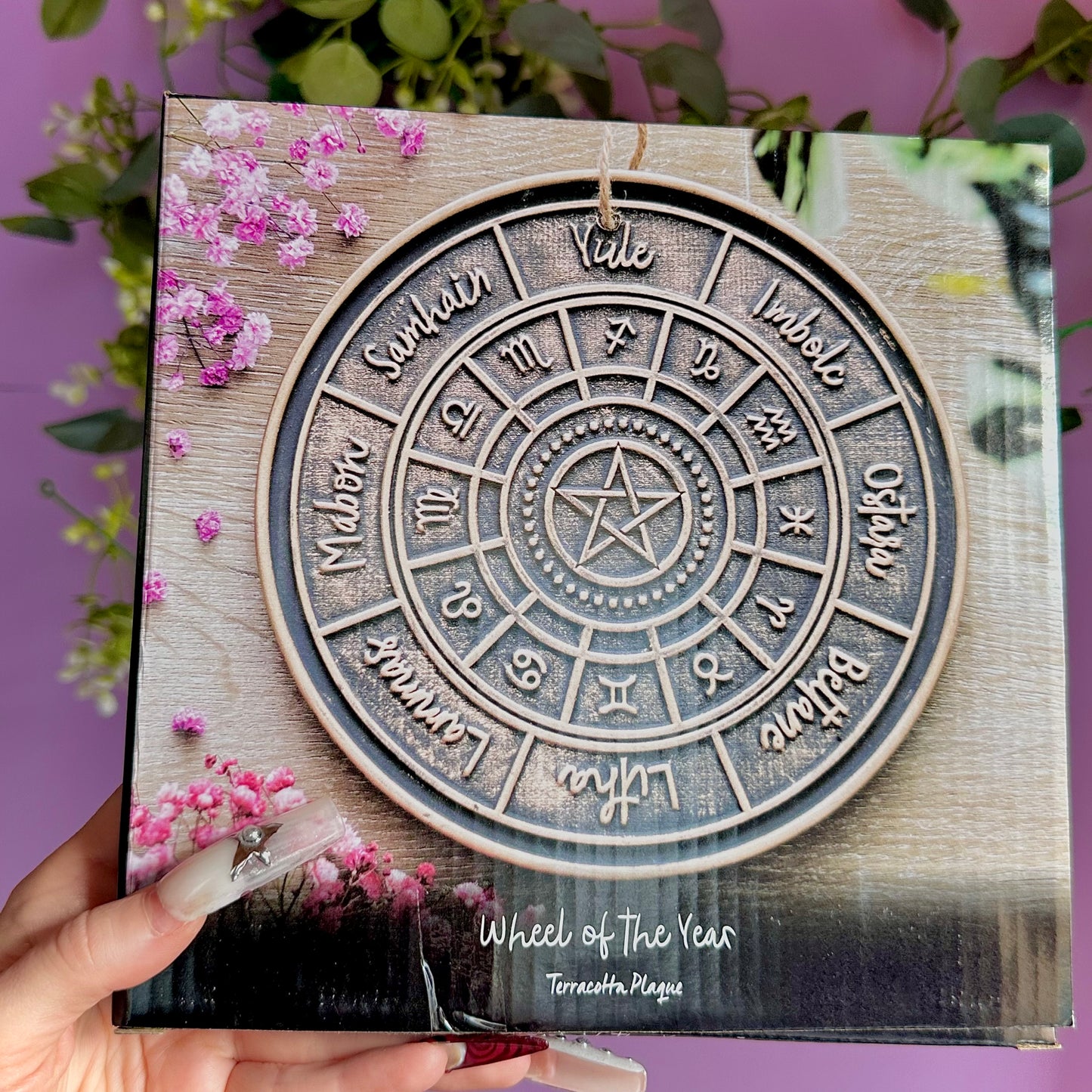 bronze wheel of the year hanging terracotta plaque