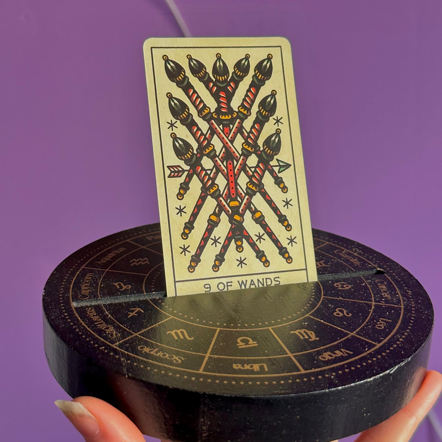 black astrology wheel tarot card stand