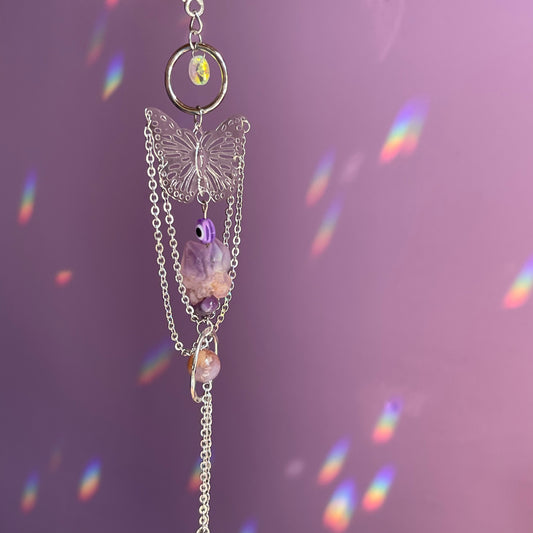 metamorphosis car charm
